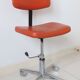 Eurosit vintage industrial workshop chair in chromed metal and orange imitation leather