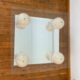 Coffee table with marbled ceramic balls and mirror