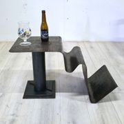 Curved sheet metal side table with magazine stand, 1980s