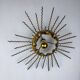 Spanish sunburst ceiling light – gilt iron rays & exposed bulb, 1960s
