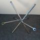 Designer smoked glass table, chrome Mikado base, vintage 1970