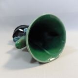 Praticality black and green vase numbered 666