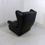 Black leather wingback chair on wheels 1960’s