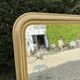 Miroir de style Louis Philippe en bois doré
