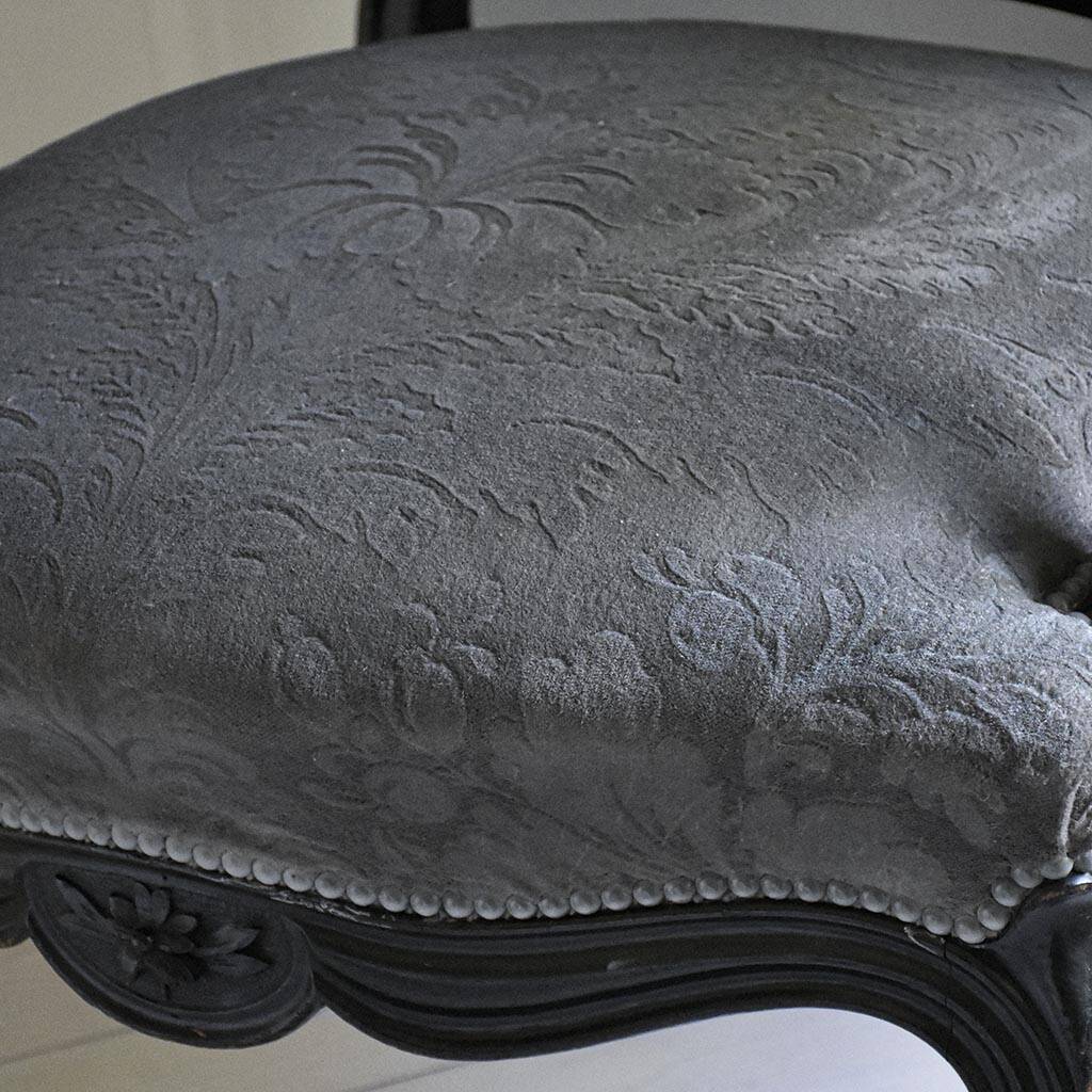 Antique armchair from the Napoléon III era, black wood with grey embossed velvet.
