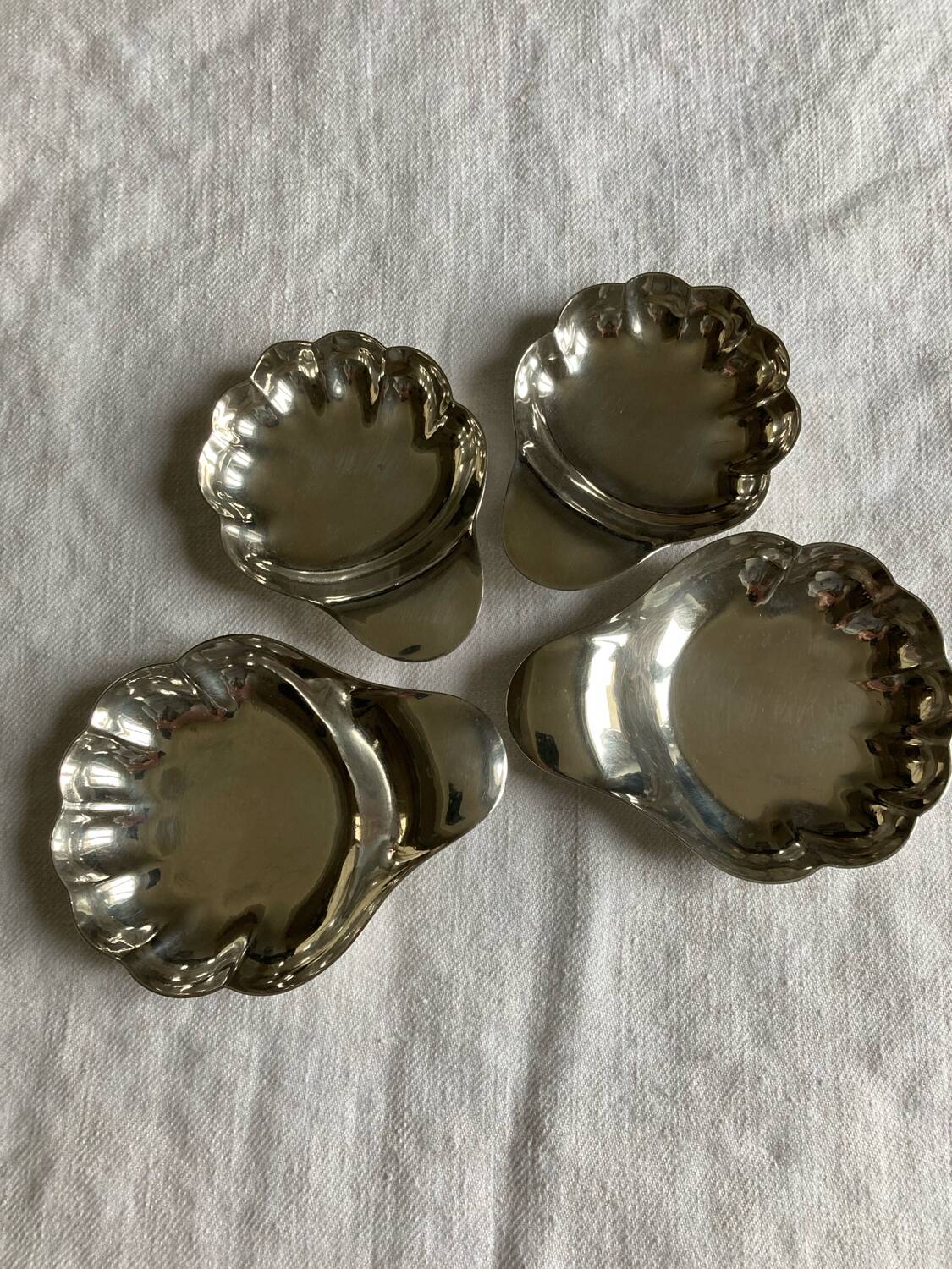 4 silver metal cups