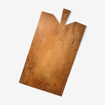 Planche à découper en bois brut ancienne