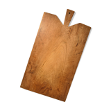 Cutting board in old raw wood