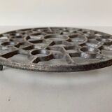 Dessous de plat ancien en fonte d'aluminium