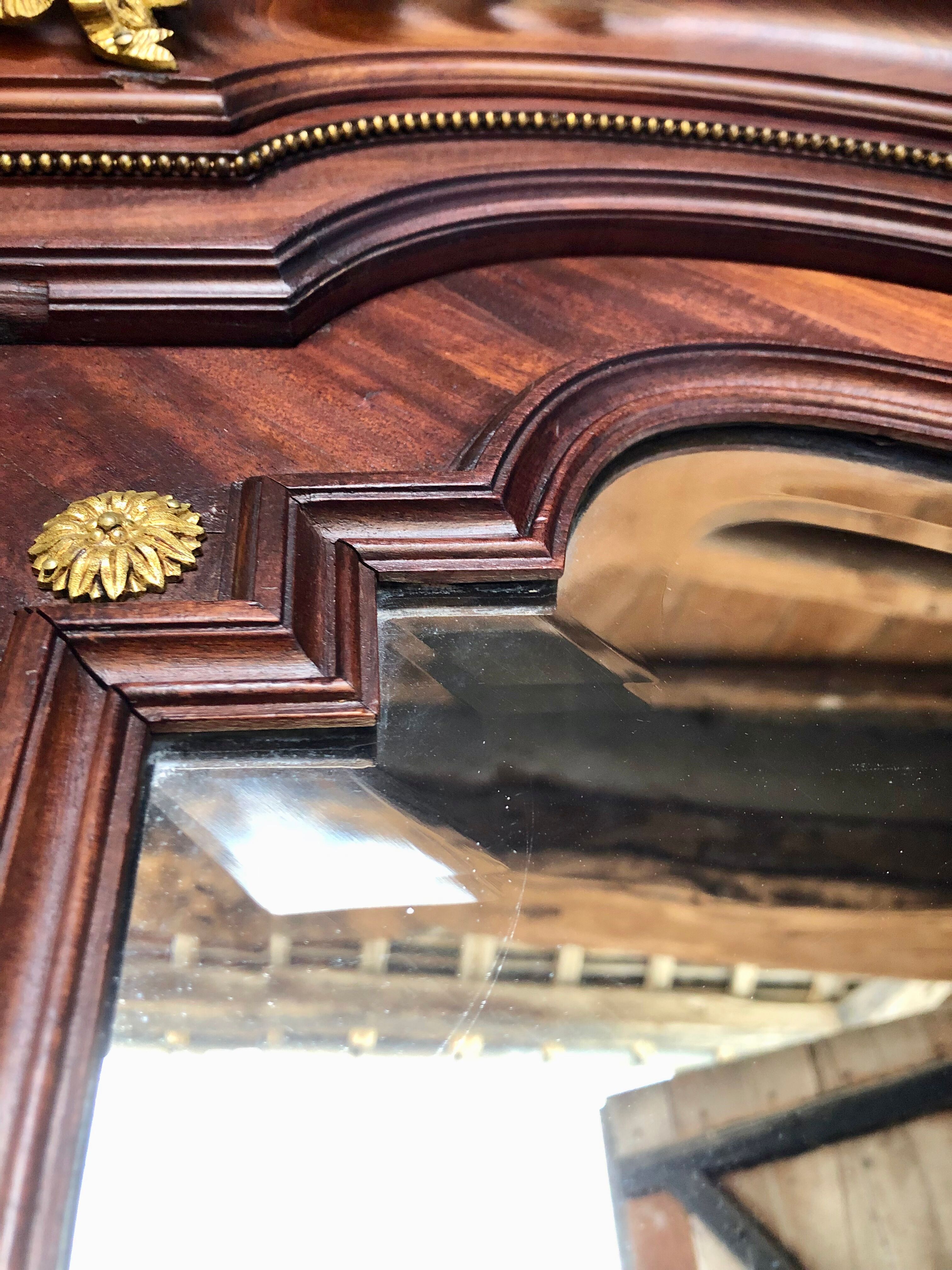Louis XVI bronze and mahogany cabinet from Mercier Frères