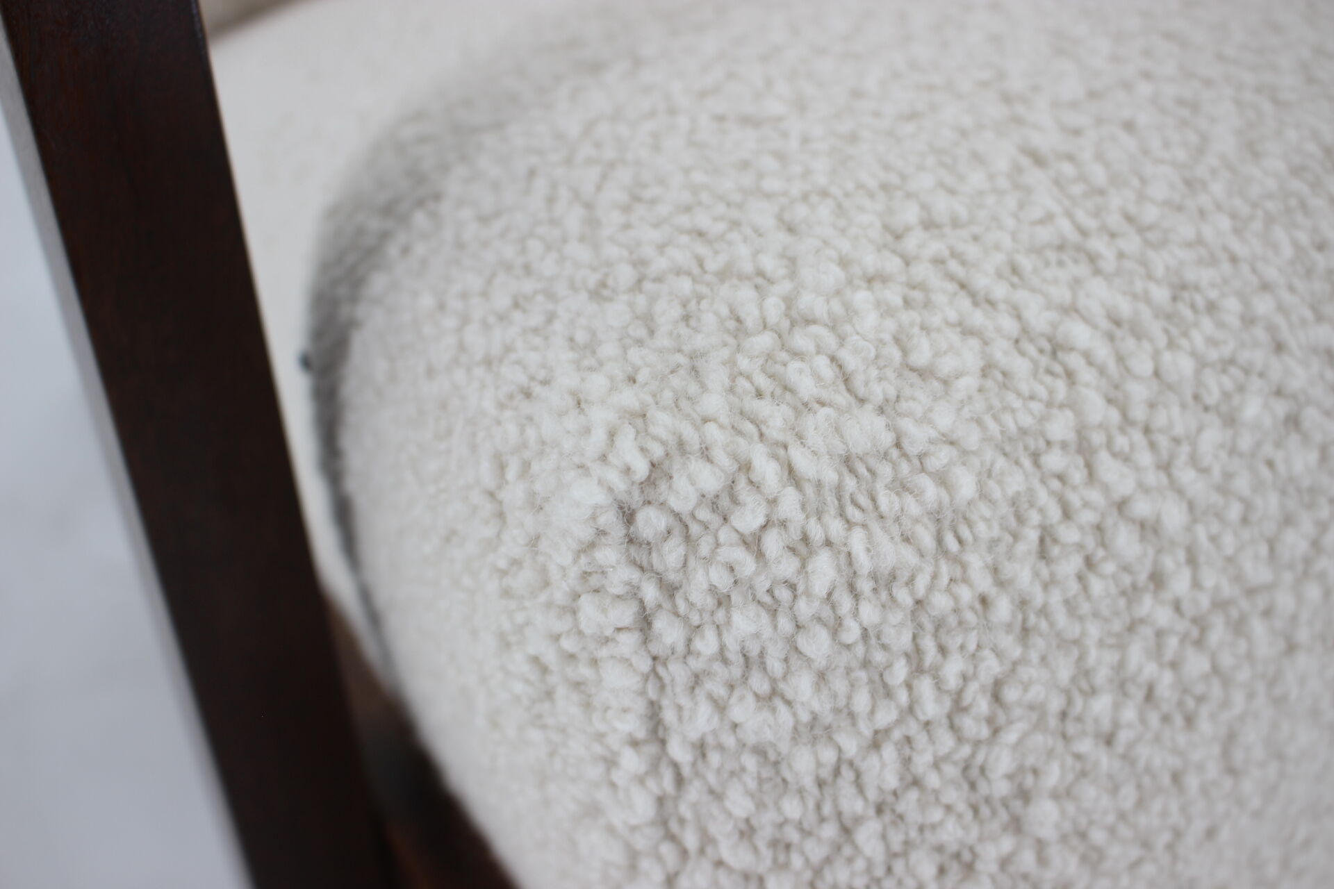 1940s large wing chair in wool boucle, restored