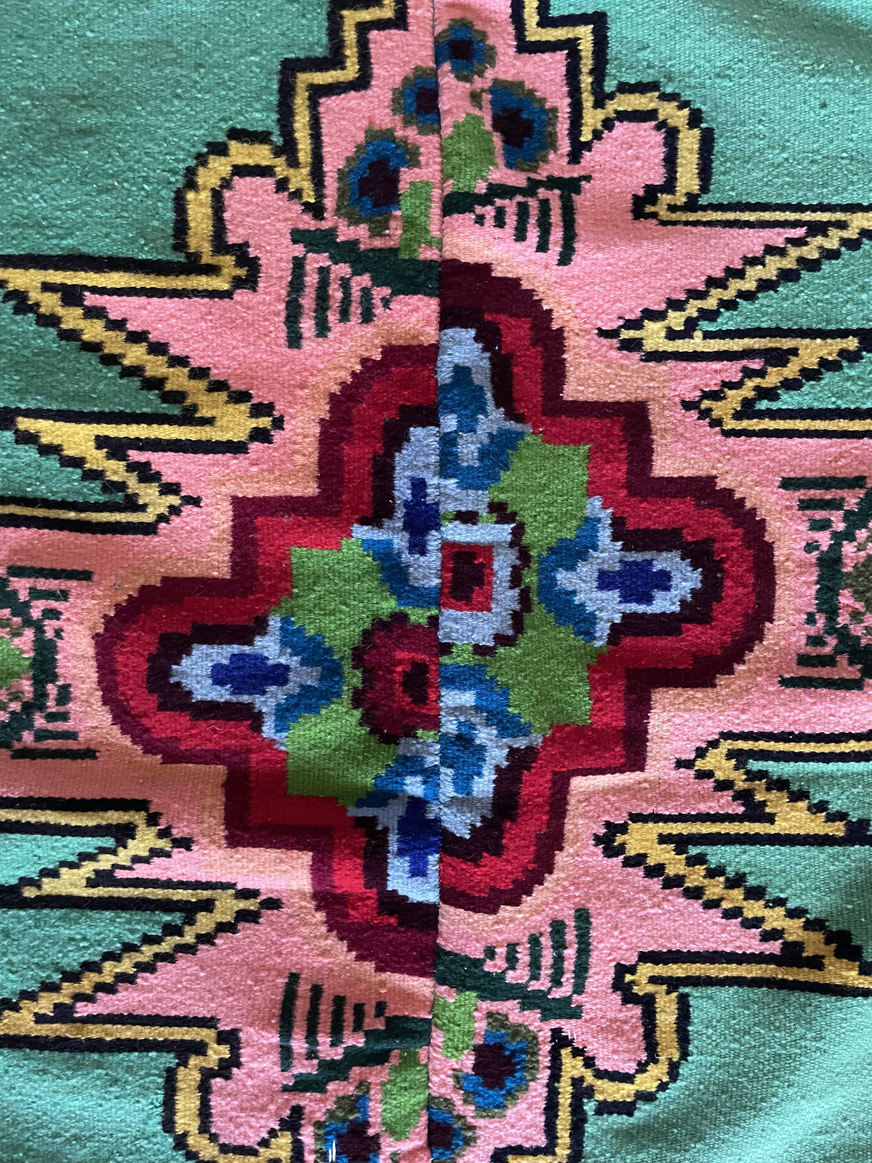 Romanian flatwoven rug geometrical design on a green turquoise background, 158x185 cm