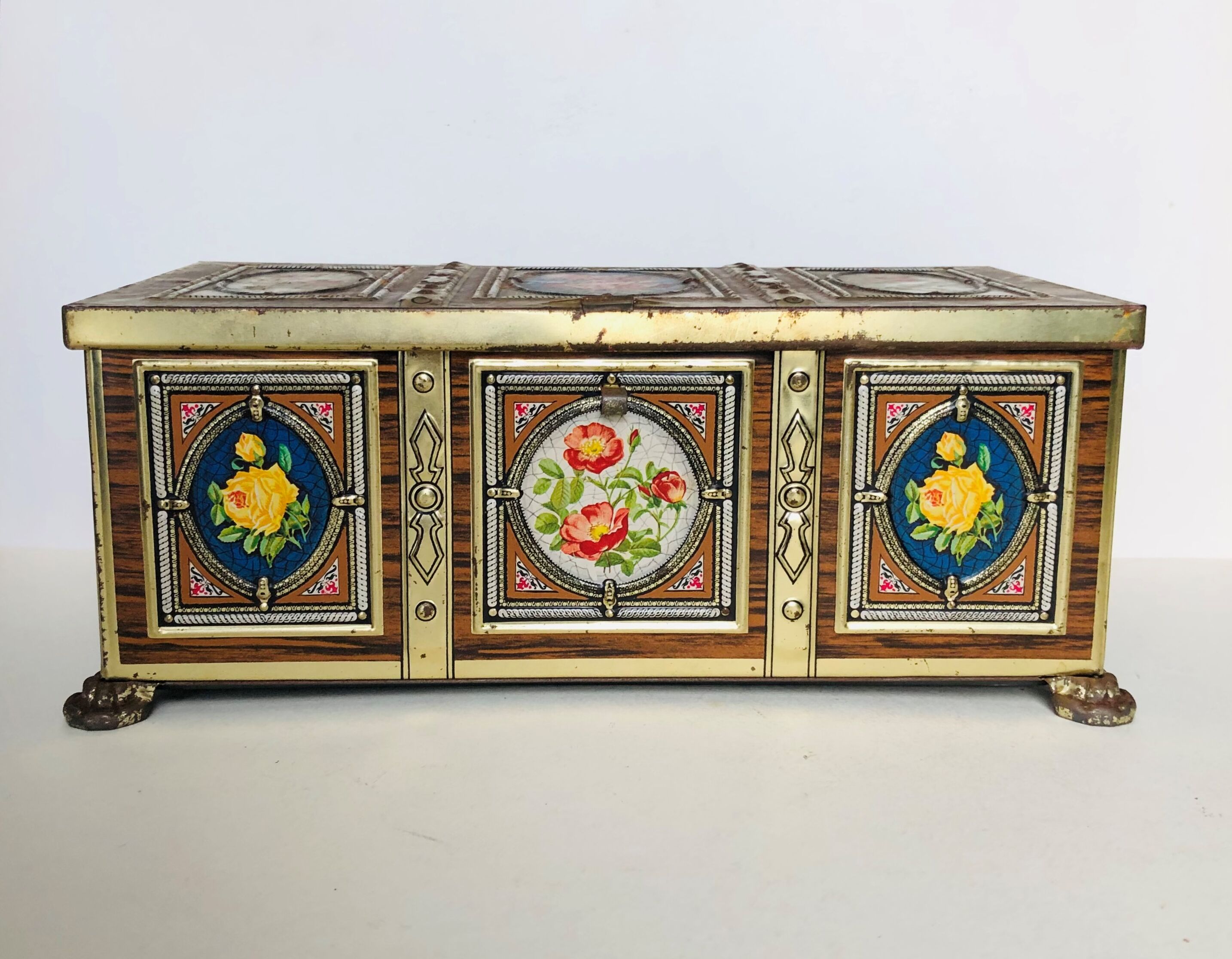 Old metal box decorated with flowers