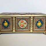 Old metal box decorated with flowers