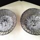 Pair of bread baskets, woven silver-plated wire baskets