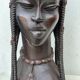 Large wooden bust of an African woman.