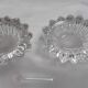 Antique crystal salt and pepper shakers, with their small spoon