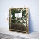 mirror with articulated wall light