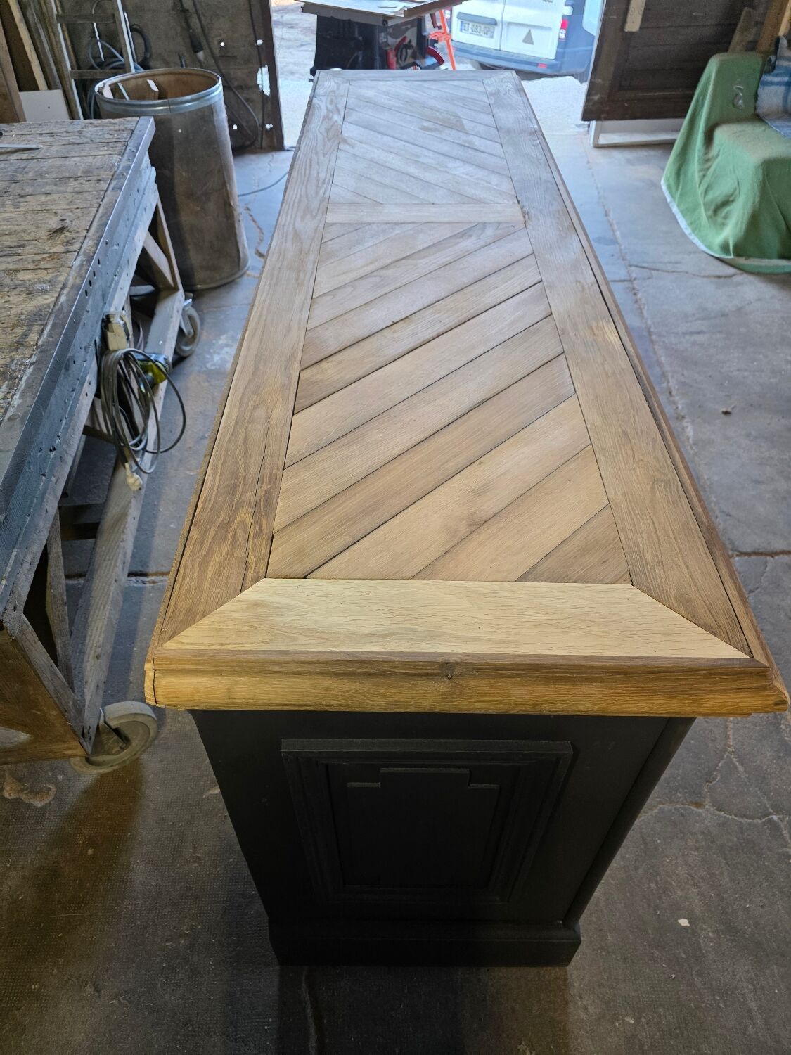 Chevron-patterned oak workbench