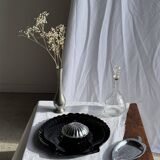 Pair of vintage black glass shell dishes D32 and D26