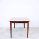 Extendable dining table in rosewood