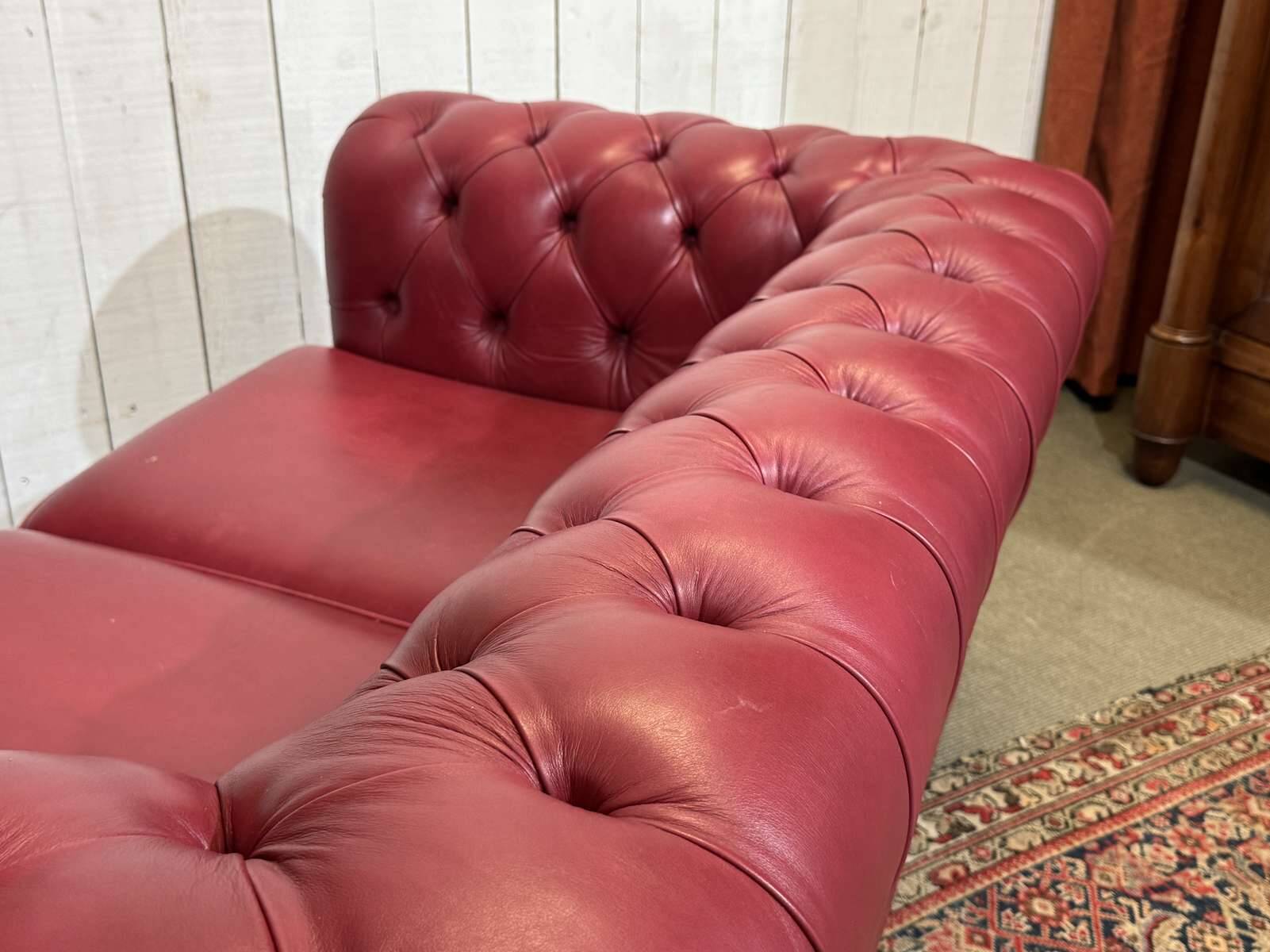 Chesterfield 2-seater leather sofa, modern production from the 2000s.