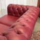 Chesterfield 2-seater leather sofa, modern production from the 2000s.