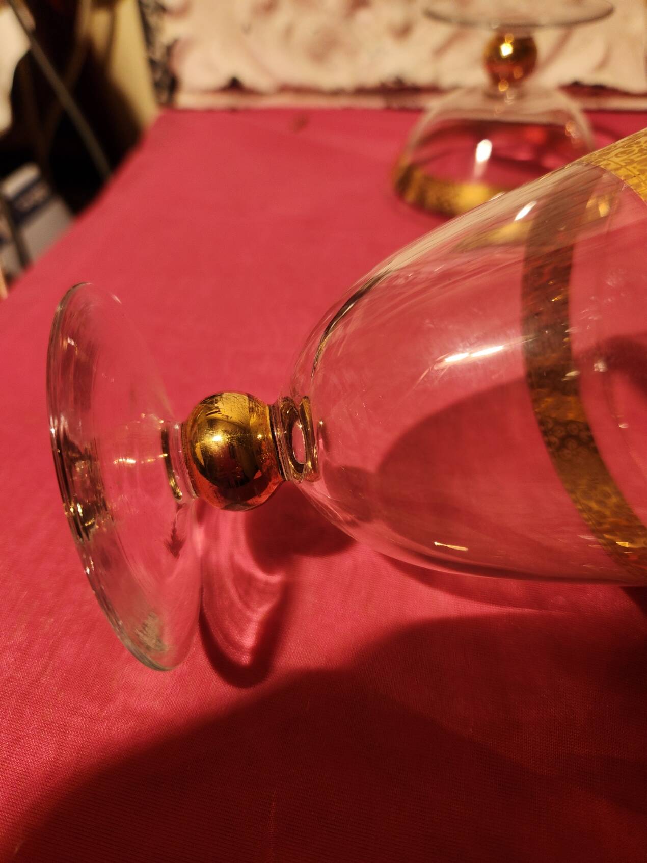 1930s footed glass service with gilding, including champagne flutes.