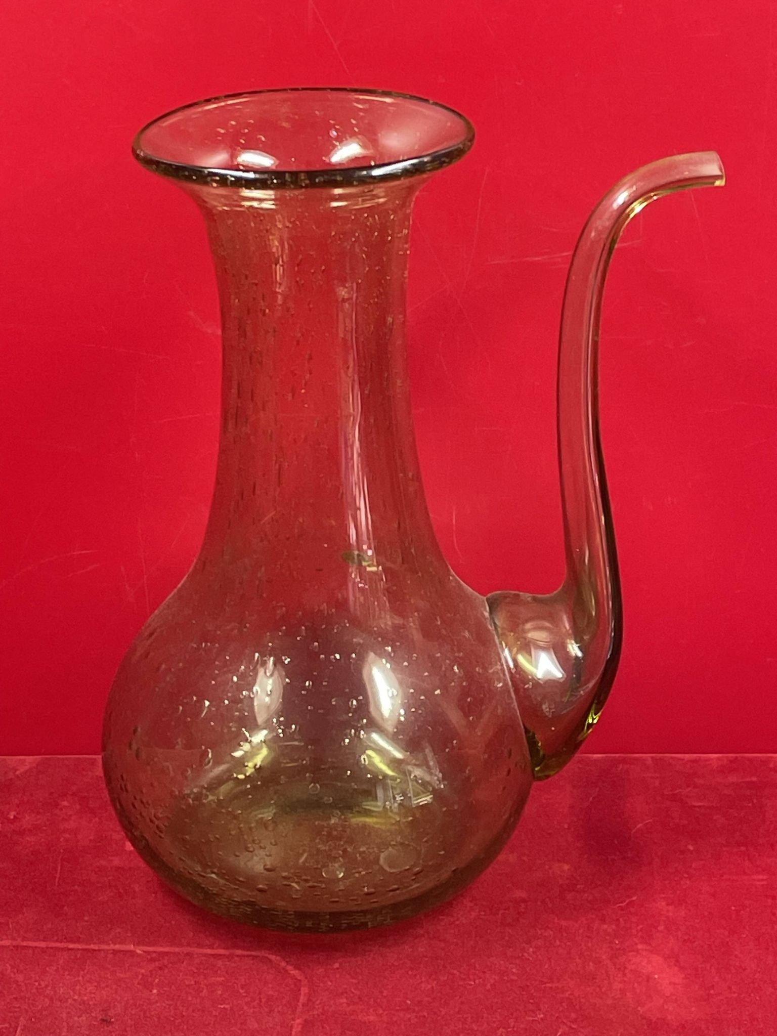 Design decanter, pourer in glassware of biot green vintage glass