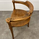 Chalet-style carved wooden tripod armchair