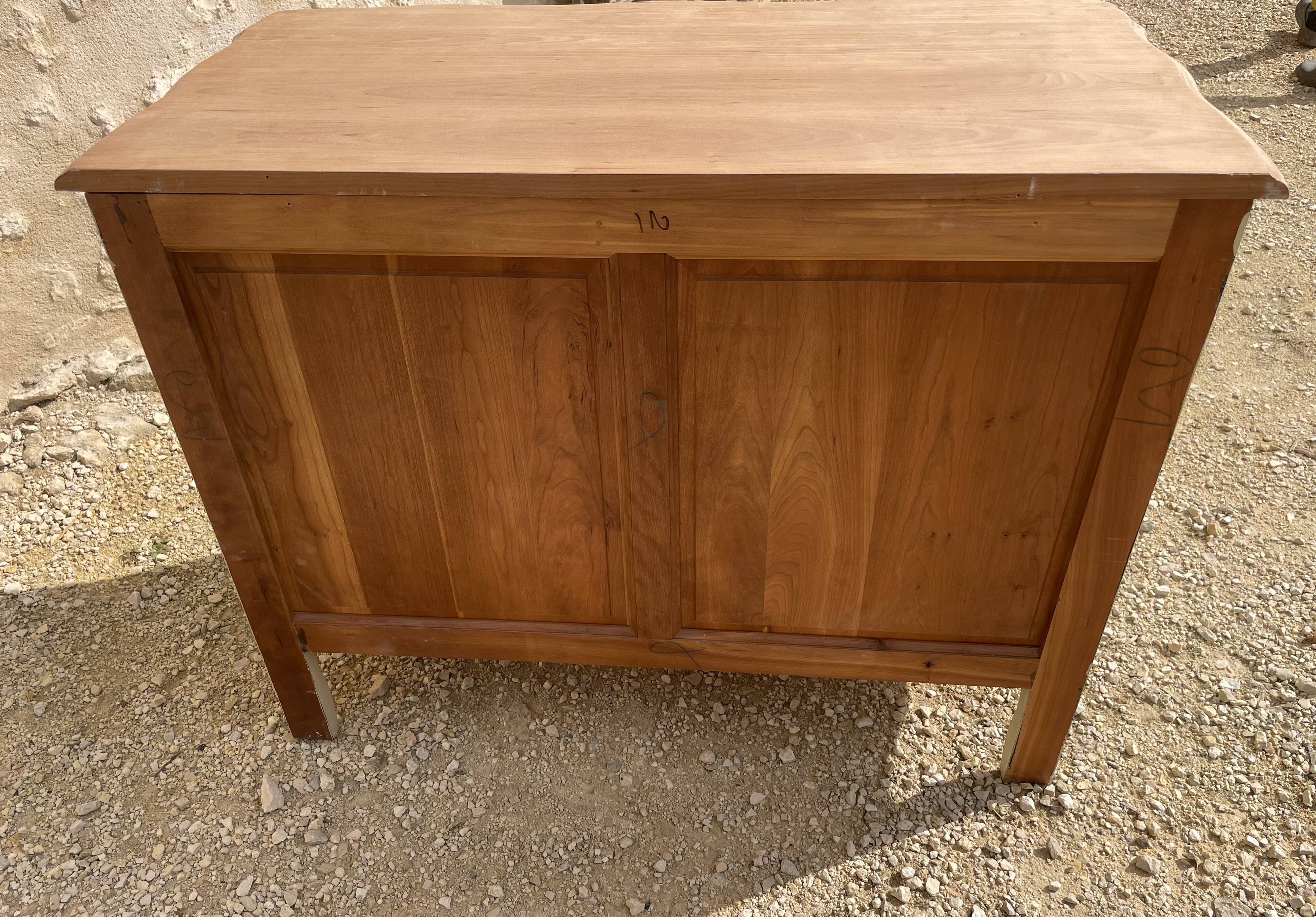 Louis XV style chest of drawers in patinated cherry wood and raw wood top
