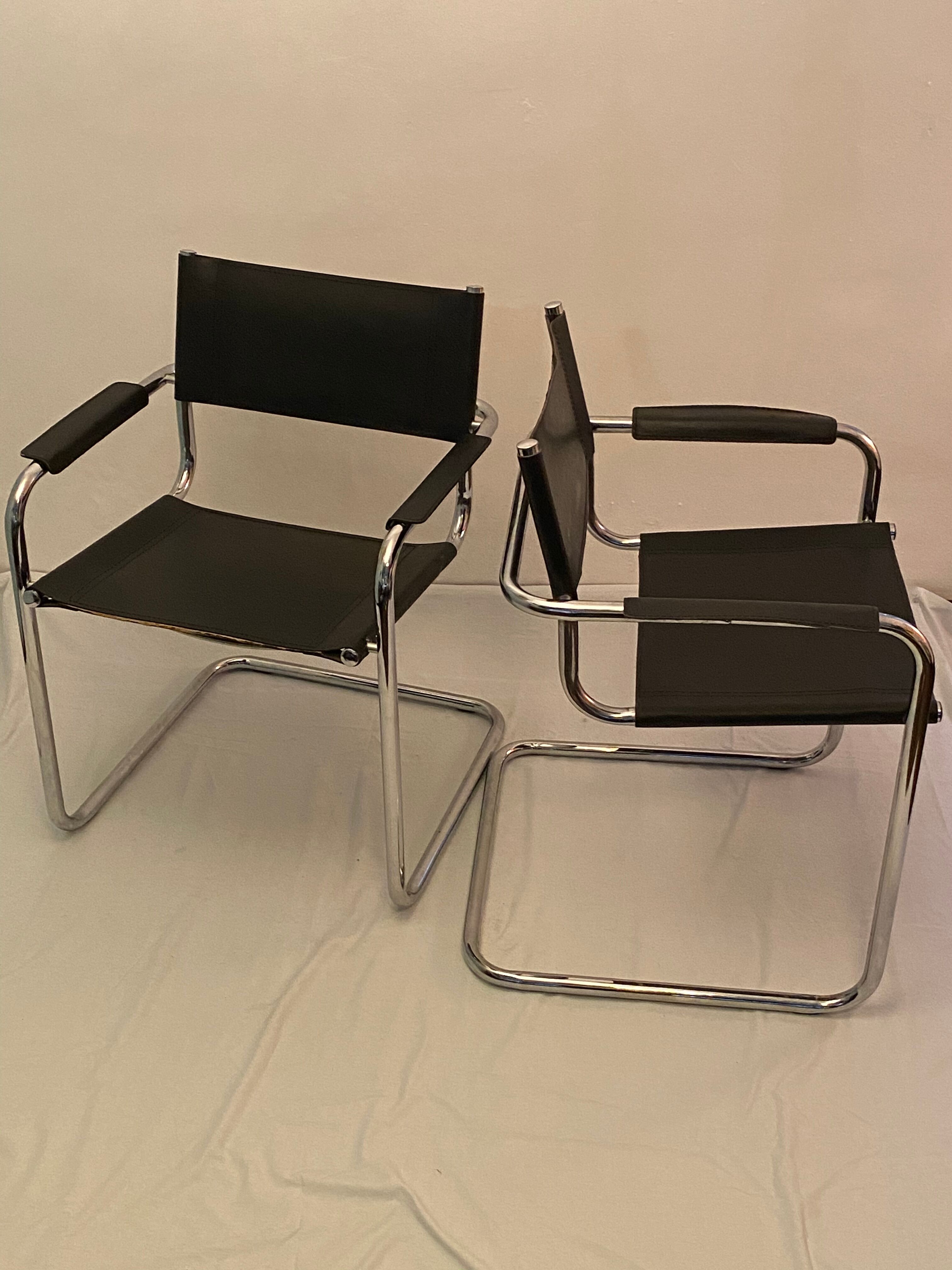Pair of chrome and leather tube chairs