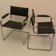 Pair of chrome and leather tube chairs