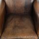 Characterful set of two sheepskin design armchairs with beautiful patina