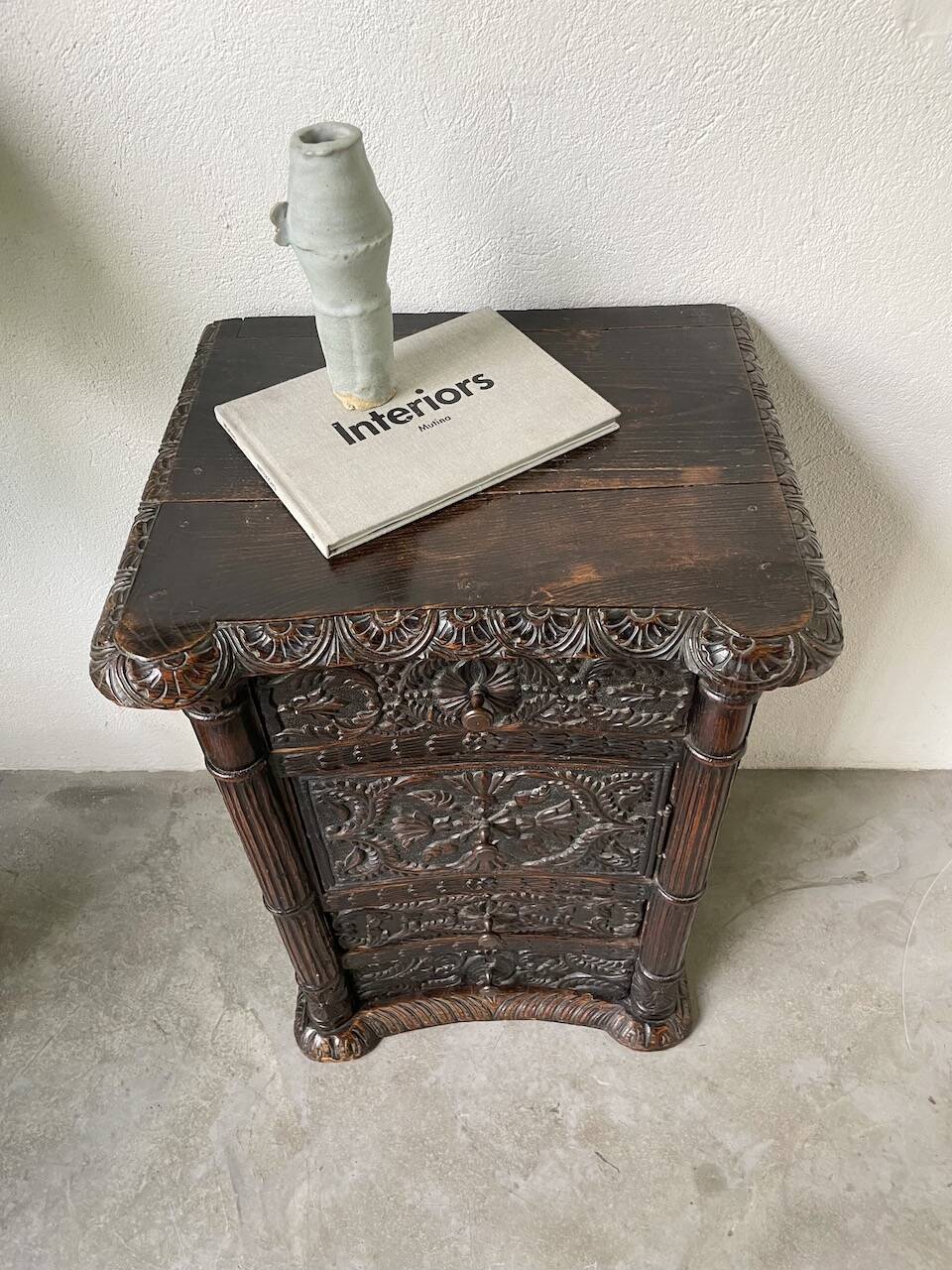 19th century chest of drawers in carved blackened pine
