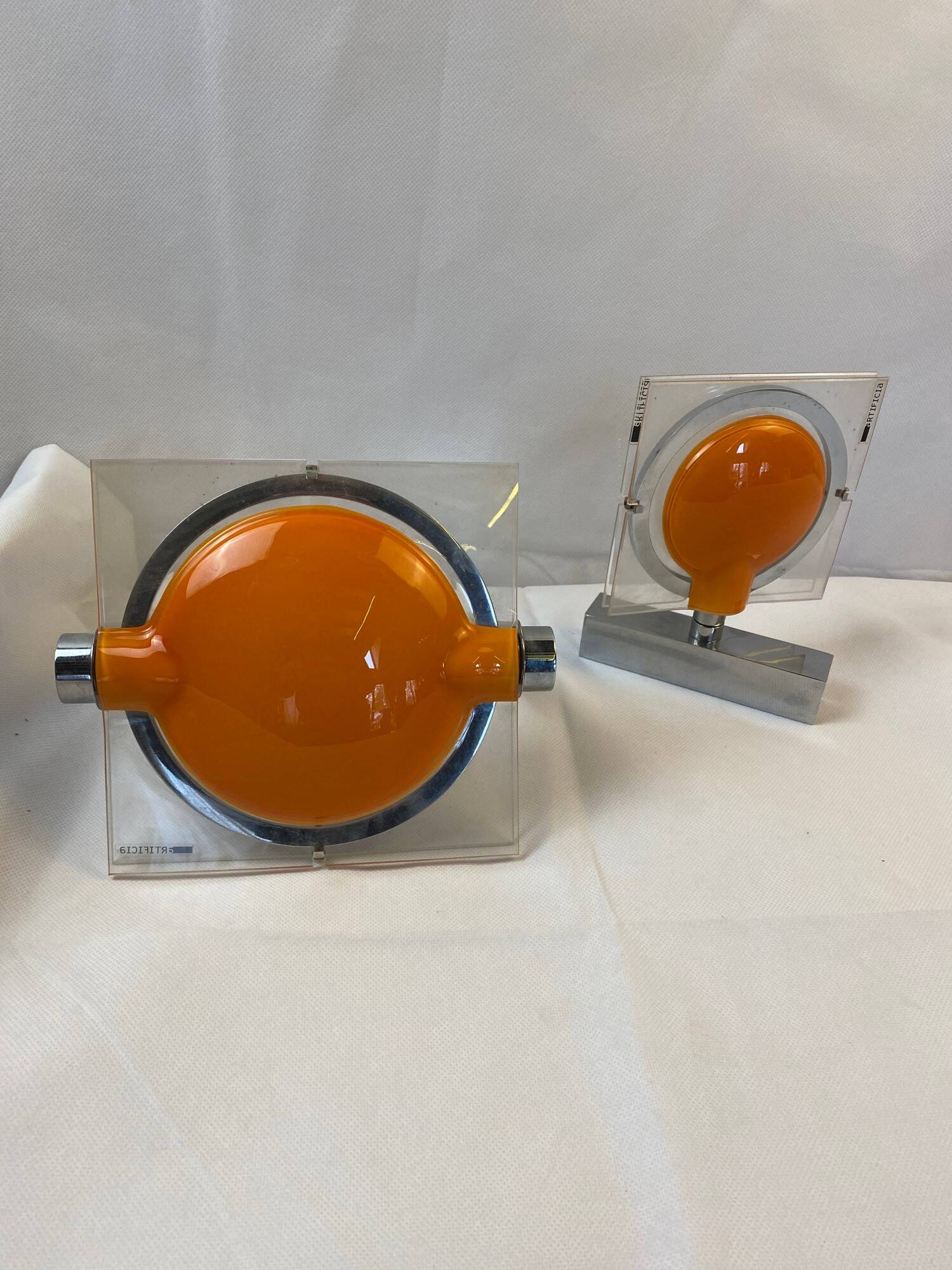 Pair of orange Keplero wall lights