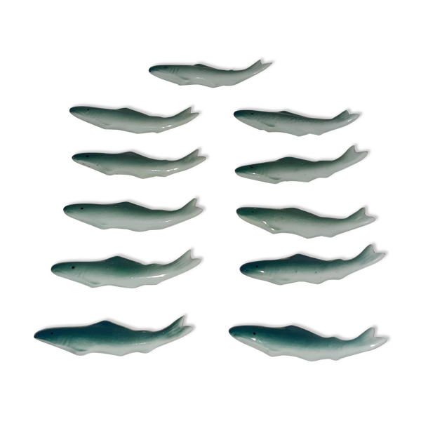 11 porte couteaux poissons en porcelaine