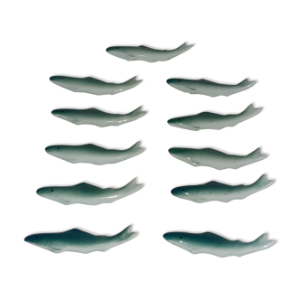 11 porcelain fish knife holders