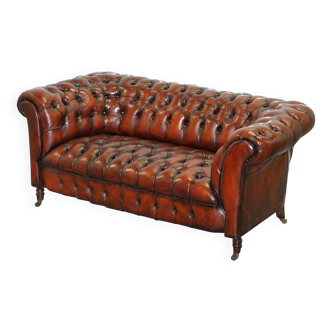 Small Victorian leather Chesterfield sofa