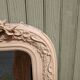 Antique carved wooden mirror