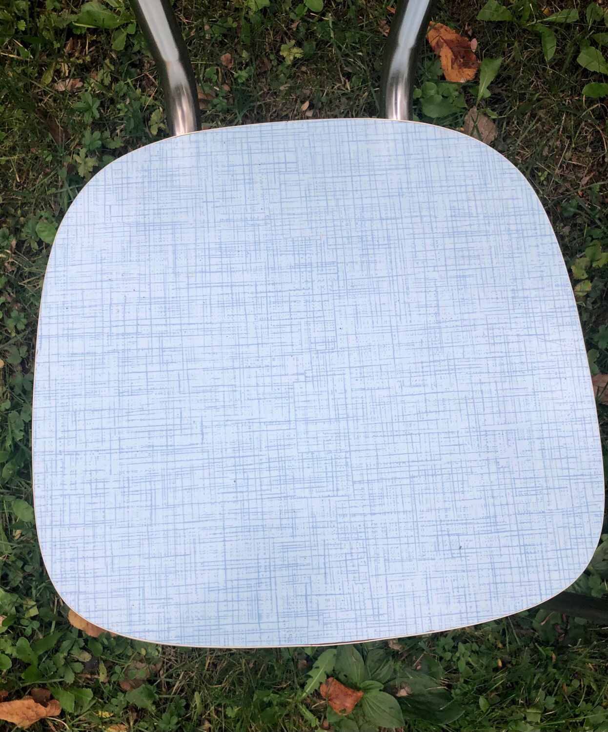 2 blue formica chairs