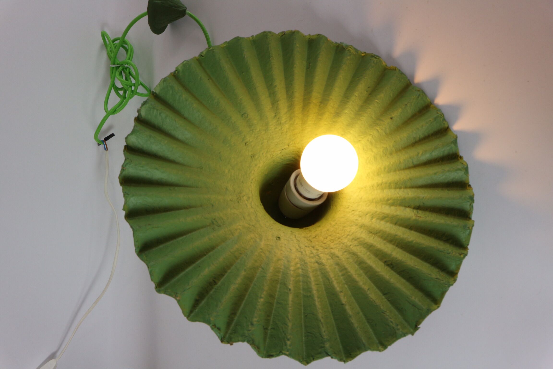 Two lamps/ pendant lamps in recycled cardboard, pink and green, seletti