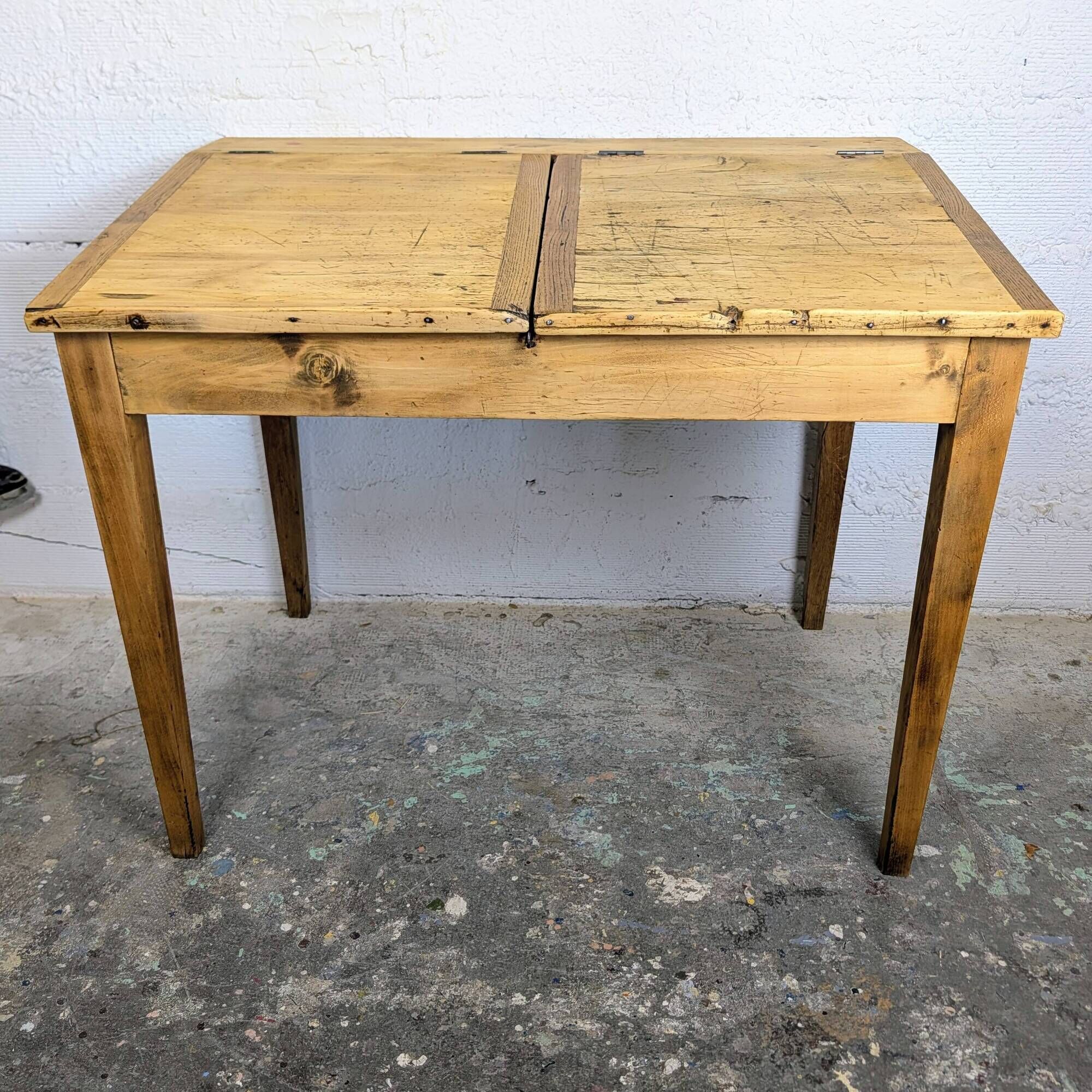 Antique wooden school desk with double lift-up tops.