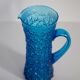 Blue glass water or juice pitcher from the mid-20th century.