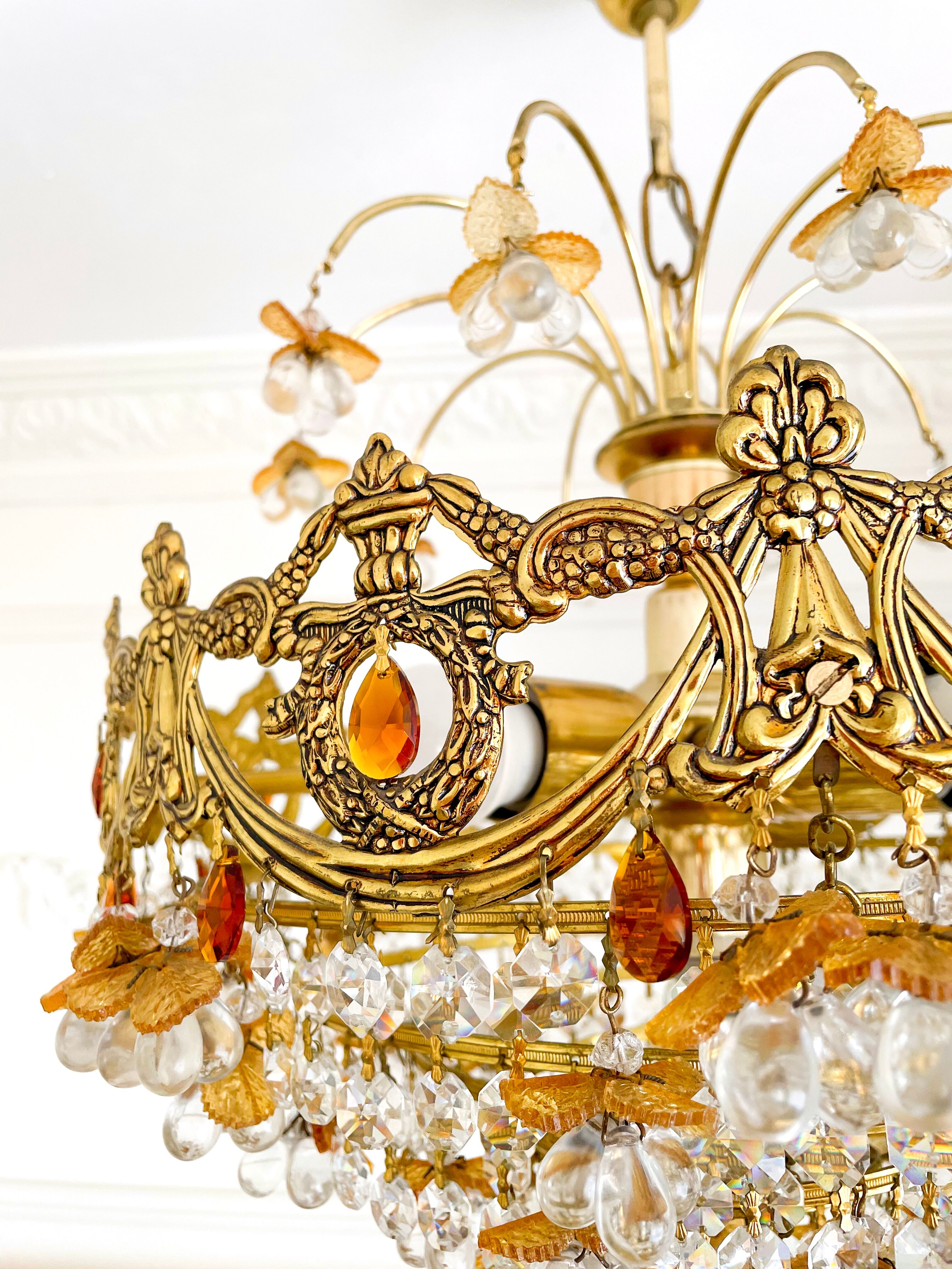 Exceptional vintage chandelier in Murano style crystal, orange, brass.