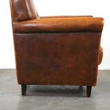 Charming and rugged sheepskin leather armchair, large model