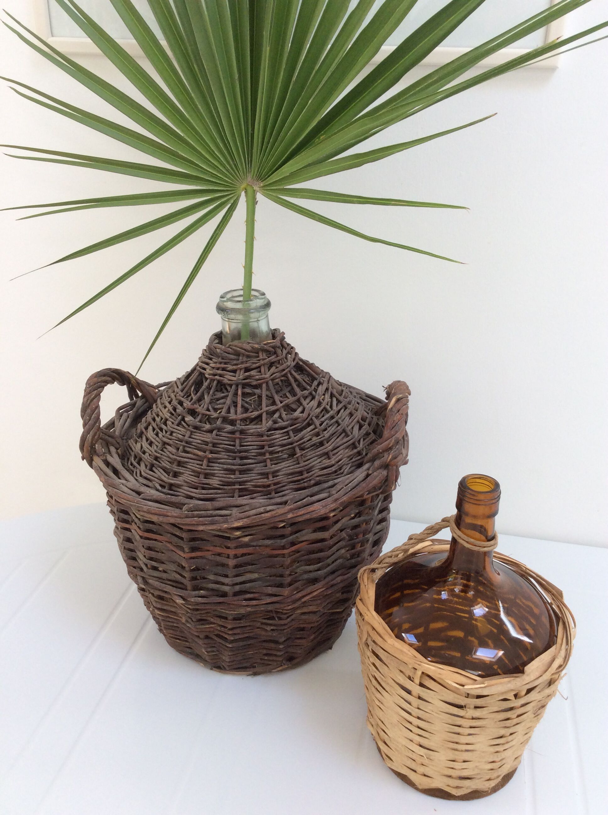Demijohn in her braided wicker basket