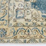 Tapis persan bleu et beige