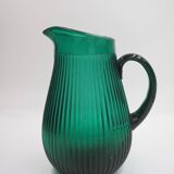 Transparent blue ribbed water jug