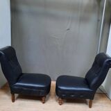 Pair of upholstered low chairs without arms